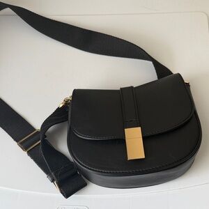 a new day Black Crossbody Bag with Gold Accent